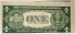 UNITED STATES OF AMERICA 1935 . ONE 1 DOLLAR BANKNOTE . ERROR . MIS-ALIGNMENT TO BACK