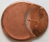 UNITED STATES OF AMERICA 1991 . ONE 1 CENT COIN . ERROR . 70% MIS-STRIKE